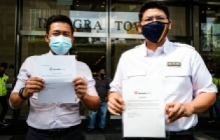 Malezya'da iktidar partisi ortağı UMNO, Macron'un İslam karşıtı politikalarını protesto etti